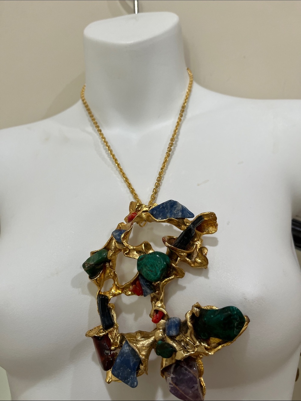 Modernist gold tone pendent or broach set with semi precious stones